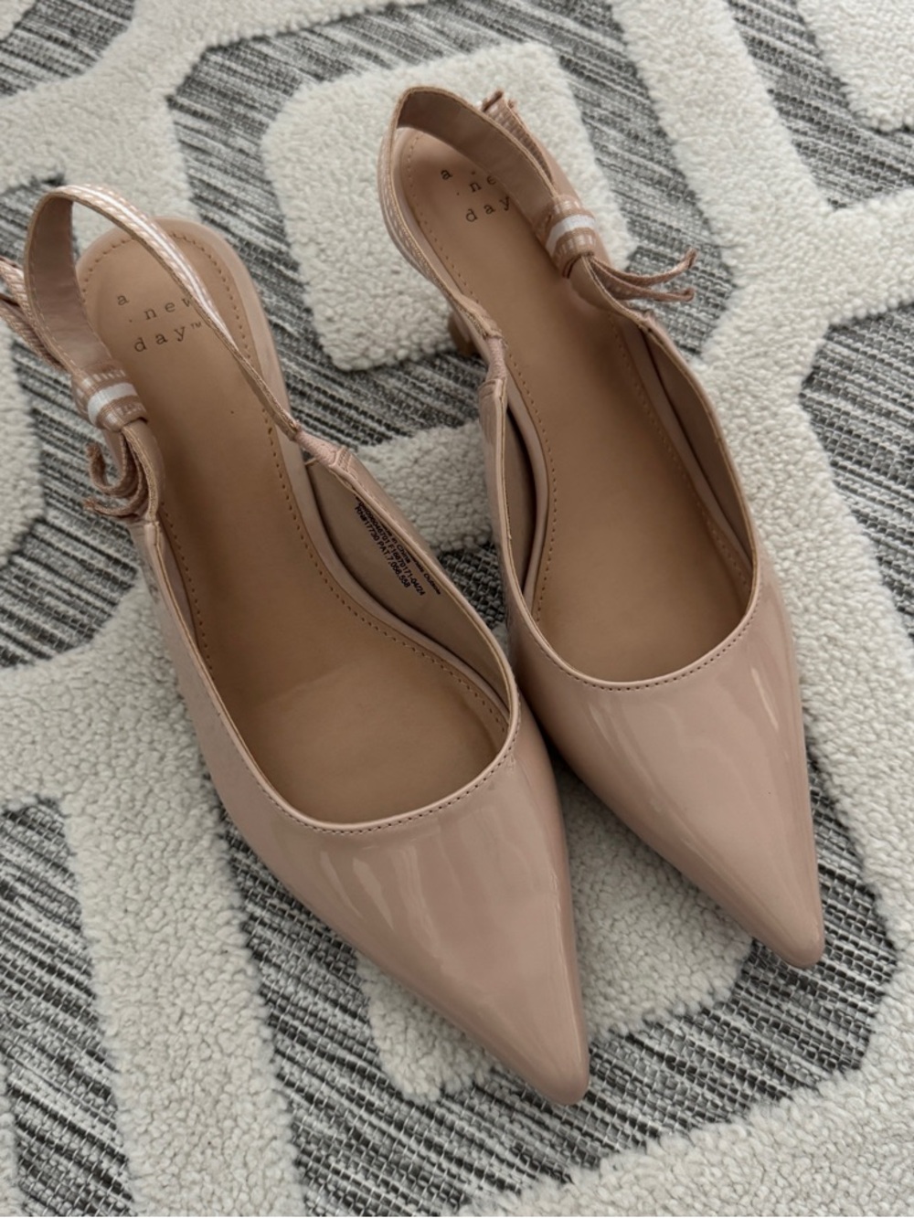 Nude pointy toe sling back kitten heels